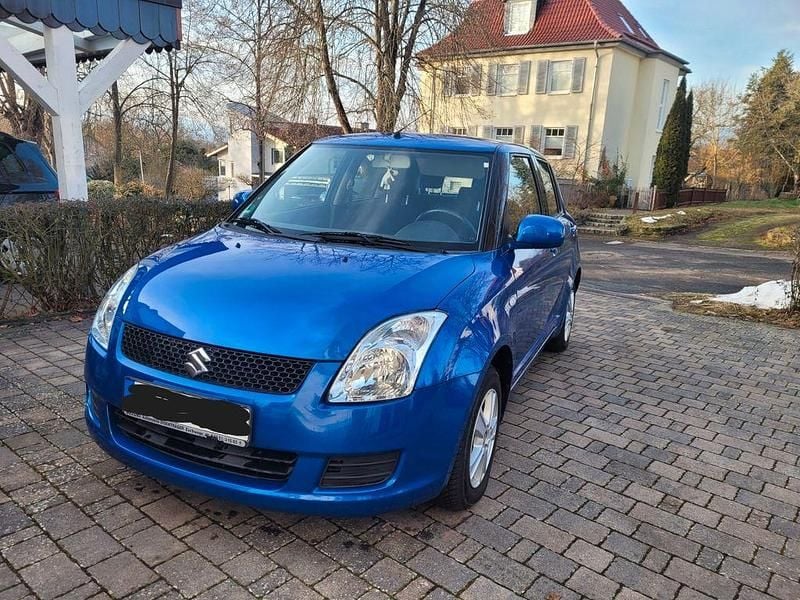 Blau Gebraucht 2009 Suzuki Swift Club Limousine | 3.990 € (Fairer Preis) - Bild 1/4