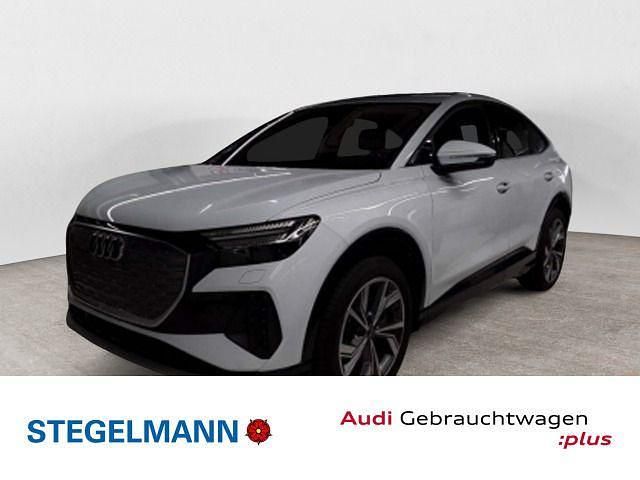 Gletscherweiß metallic Gebraucht 2024 Audi Q4 Sportback e-tron Advanced SUV | 43.510 € - Bild 1/4