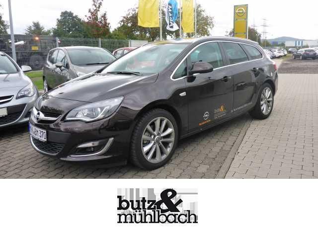 Braun metallic Gebraucht 2014 Opel Astra Exklusiv Kombi | 24.990 € - Bild 1/4