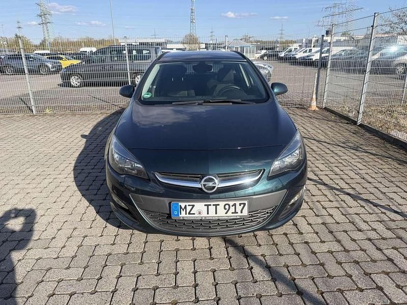 Używany Opel Astra Style 140 KM (102 kW) 2014 Zielony Kombi
