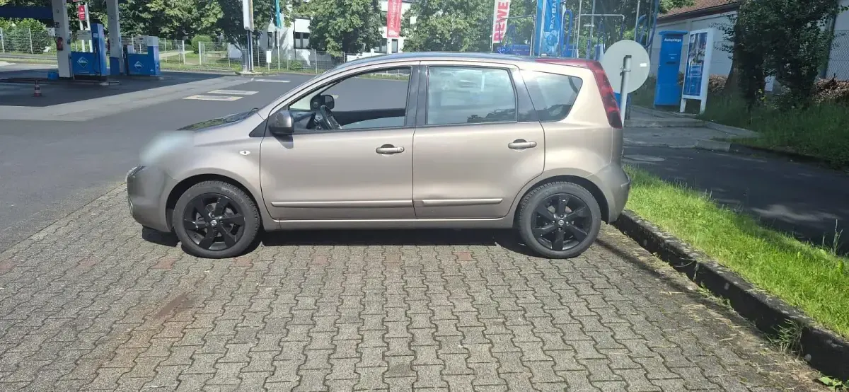 Gebraucht Nissan Note 90 PS (66 kW) 2012 Braun Kleinwagen