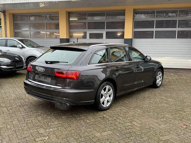 Gebraucht Audi A6 Business 218 PS (160 kW) 2015 Oolonggrau metallic Kombi