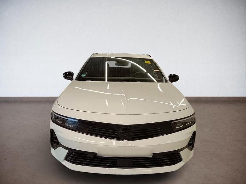 Gebraucht Opel Astra 131 PS (96 kW) 2024 Lack weiss banquise/typ aussenverkleidun Kombi