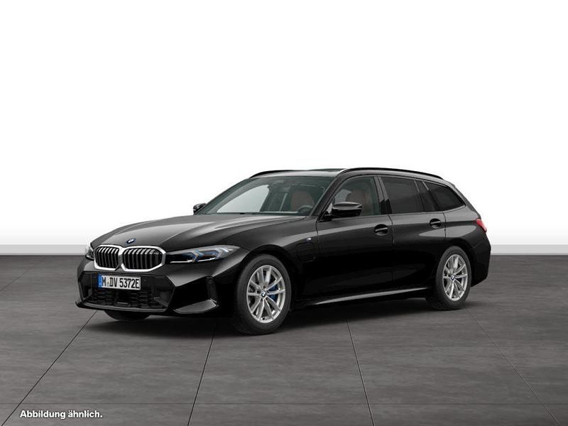 Black sapphire metallic Gebraucht 2024 BMW 330e Comfort Edition Kombi | 54.624 € - Bild 1/3