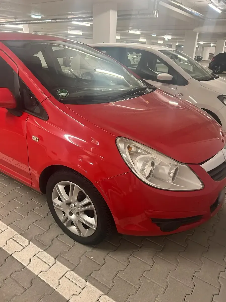 Gebraucht Opel Corsa 80 PS (58 kW) 2009 Rot Kleinwagen