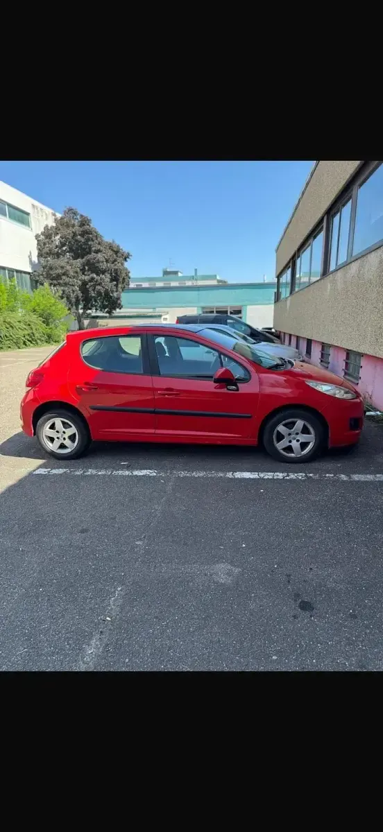 Gebraucht Peugeot 207 73 PS (53 kW) 2010 Rot Kleinwagen