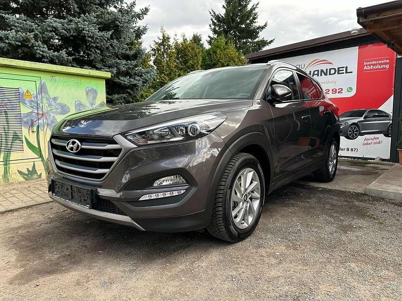 Braun Gebraucht 2015 Hyundai Tucson Intro Edition SUV | 14.499 € (Fairer Preis) - Bild 1/4
