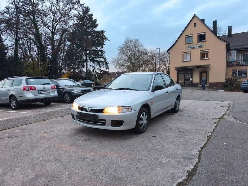 Grau Gebraucht 1997 Mitsubishi Lancer Limousine | 1.999 € - Bild 1/4