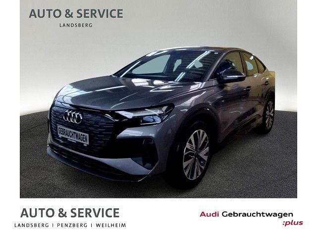 Grau Gebraucht 2022 Audi Q4 Sportback e-tron Sport SUV | 35.490 € (Guter Preis) - Bild 1/4