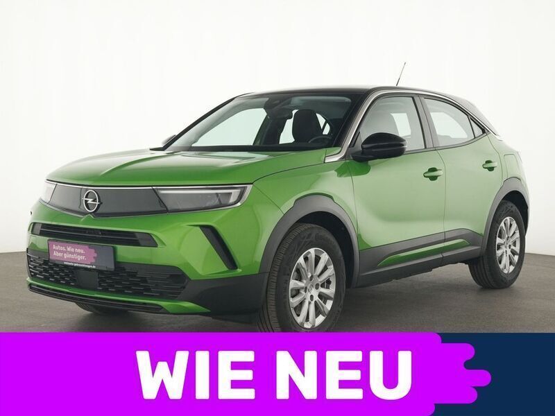 Matcha green Gebraucht 2023 Opel Mokka-e Active SUV | 20.677 € (Guter Preis) - Bild 1/4