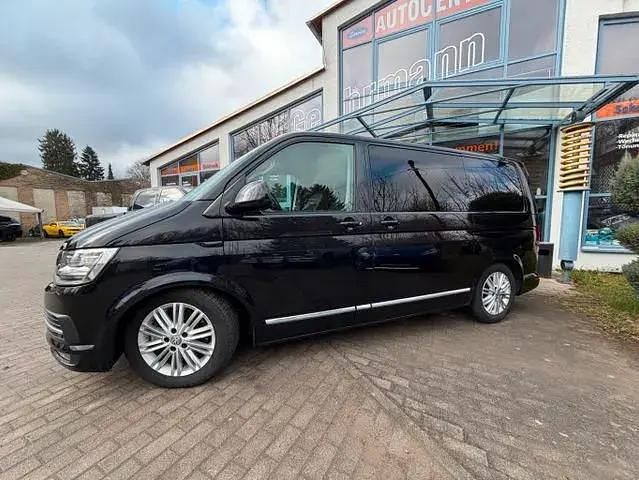 Käytetty VW Multivan 2016 Musta Tila-auto