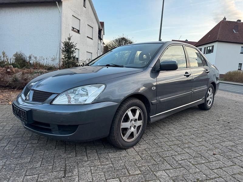 Grau Gebraucht 2006 Mitsubishi Lancer Limousine | 1.950 € (Fairer Preis) - Bild 1/4