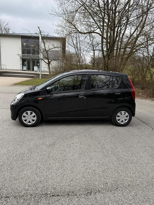 Gebraucht Daihatsu Cuore 69 PS (50 kW) 2008 Schwarz Kleinwagen