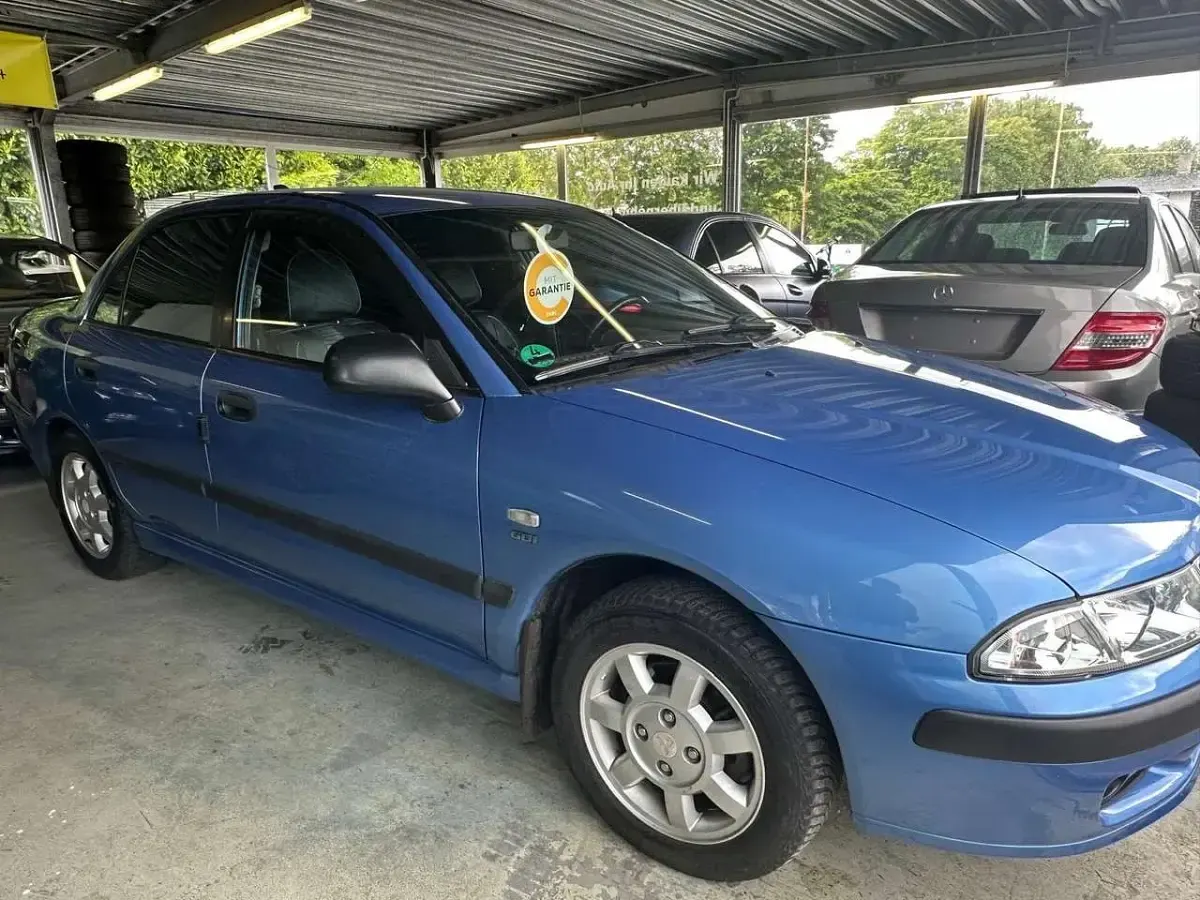 Gebraucht Mitsubishi Carisma 125 PS (91 kW) 1999 Blau Limousine