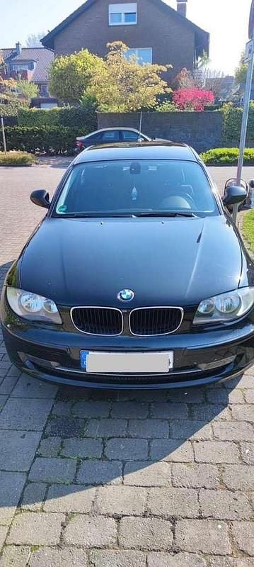 Second-hand BMW 116 122 CP (89 kW) 2011 Negru Hatchback