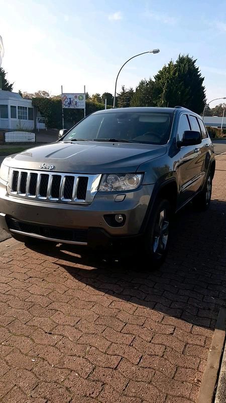 Grau Gebraucht 2012 Jeep Grand Cherokee SUV | 7.200 € (Guter Preis) - Bild 1/1