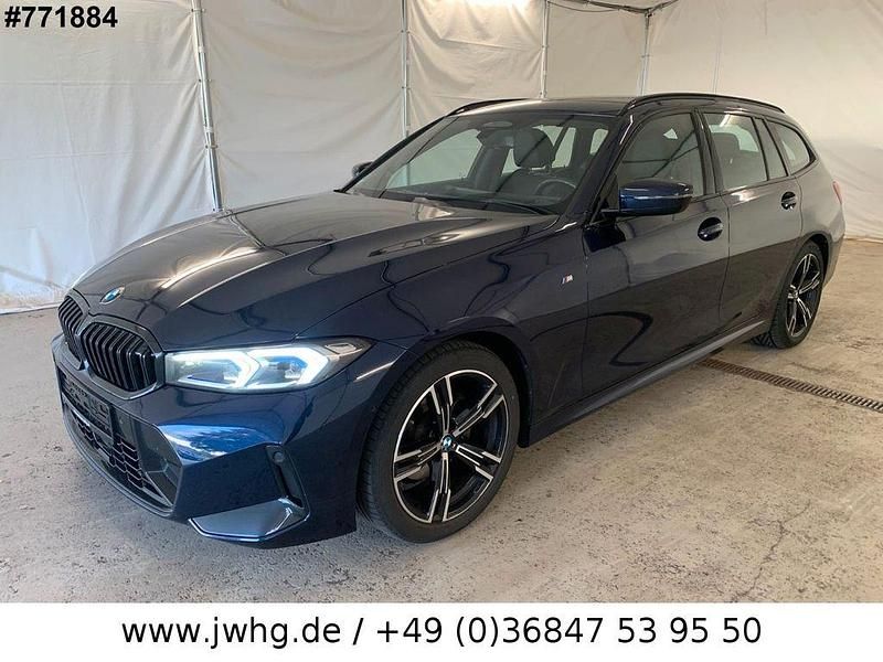 Tansanitblau (metallic) Gebraucht 2023 BMW 320 M Sport Kombi | 36.950 € (Fairer Preis) - Bild 1/4