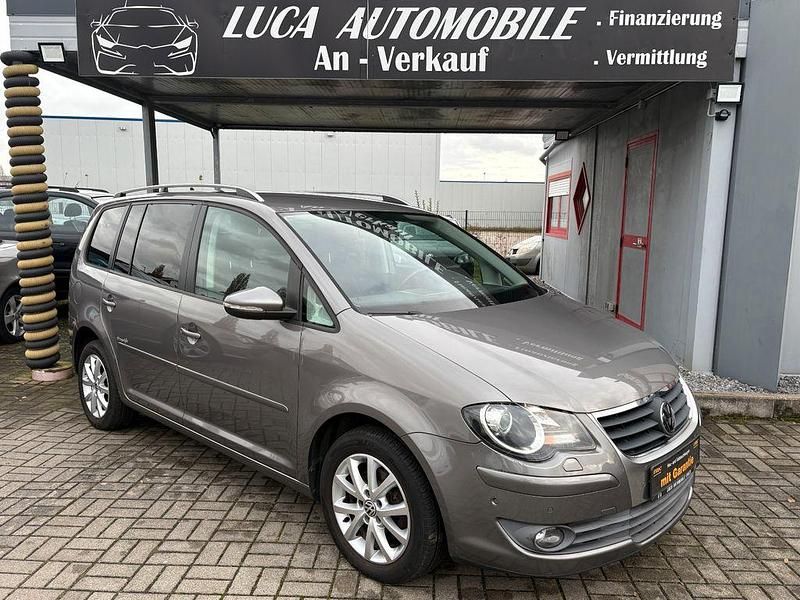 Grau Gebraucht 2009 VW Touran Freestyle Van / Kleinbus | 4.999 € (Fairer Preis) - Bild 1/4