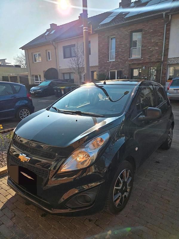 Gebraucht Chevrolet Spark 68 PS (50 kW) 2012 Schwarz Kleinwagen