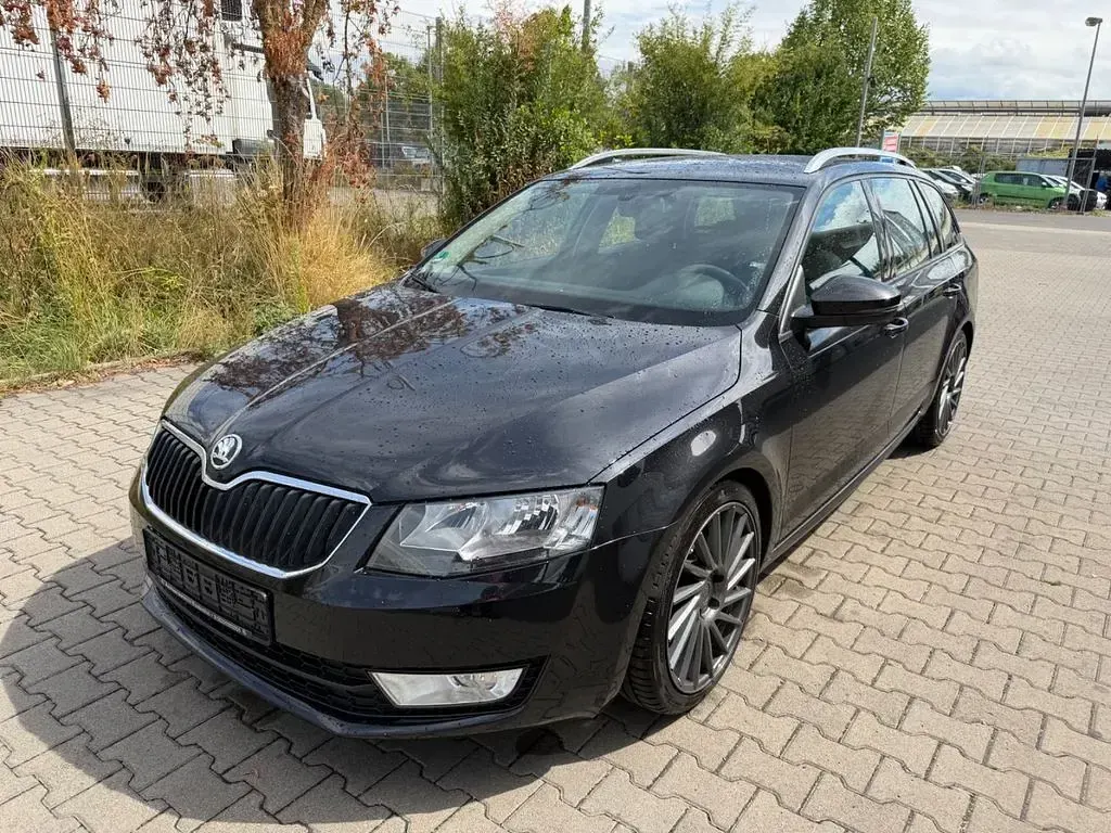 Gebraucht Skoda Octavia Ambition 105 PS (77 kW) 2014 Schwarz Kombi