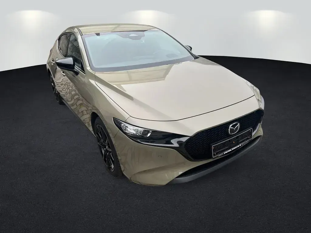 Gebraucht Mazda 3 Nagisa 140 PS (102 kW) 2024 Zircon sand (metallic) Limousine