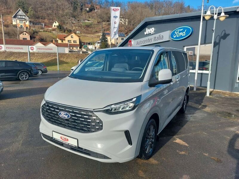 Grau Gebraucht 2024 Ford Tourneo Custom Titanium Van | 59.990 € - Bild 1/4