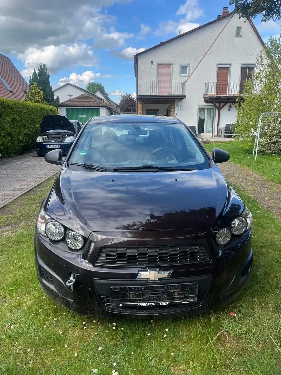 Gebraucht Chevrolet Aveo 101 PS (74 kW) 2013 Braun Limousine