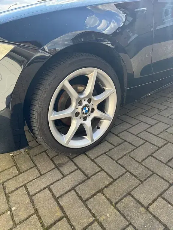 Second-hand BMW 116 122 CP (89 kW) 2006 Negru Hatchback