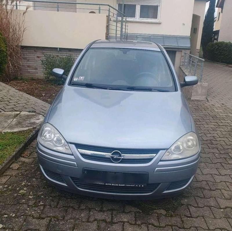 Grau Gebraucht 2006 Opel Corsa Edition Limousine | 1.500 € (Fairer Preis) - Bild 1/4