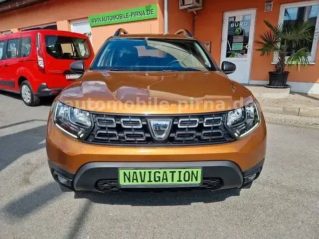 Używany Dacia Duster 131 KM (96 kW) 2019 Pomarańczowy SUV