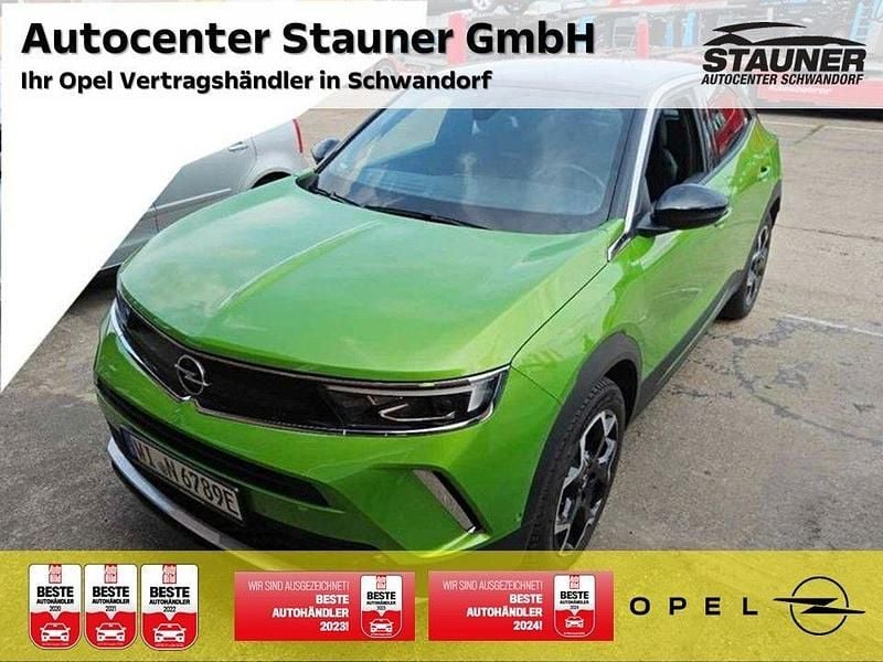 Grün Gebraucht 2023 Opel Mokka-e Ultimate SUV | 18.580 € (Superpreis) - Bild 1/4