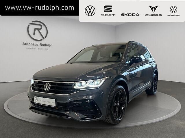 Delfingrau metallic Gebraucht 2024 VW Tiguan Style SUV | 43.950 € (Fairer Preis) - Bild 1/2