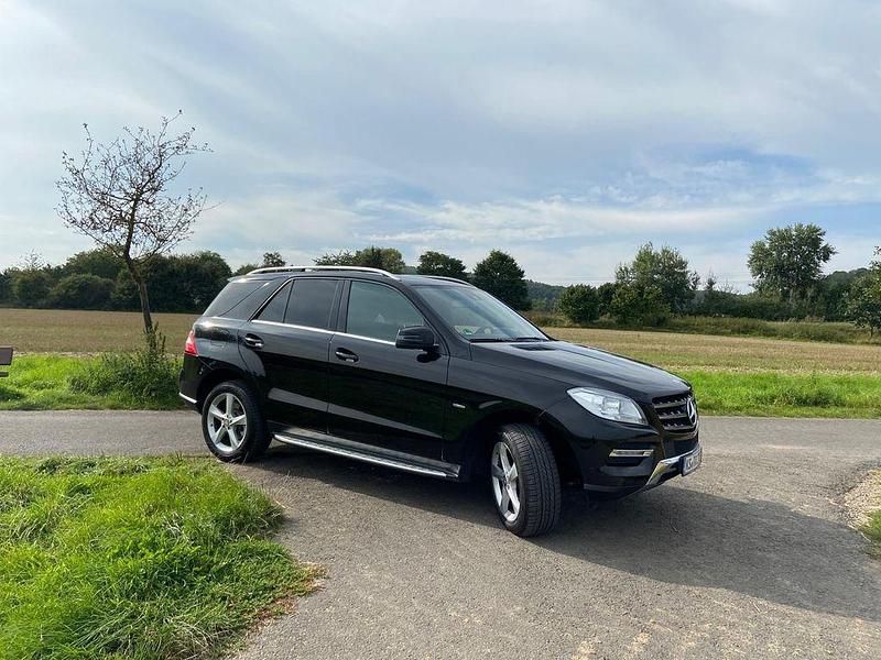 Schwarz Gebraucht 2011 Mercedes 350 SUV | 19.900 € - Bild 1/4