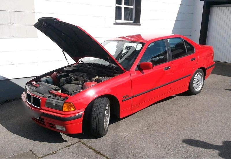 Gebraucht BMW 316 105 PS (77 kW) 1994 Rot Limousine