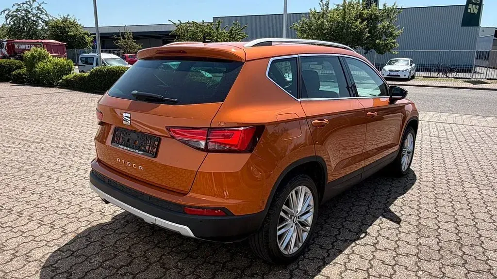Używany Seat Ateca XCELLENCE 150 KM (110 kW) 2018 Pomarańczowy SUV
