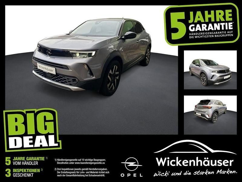 Kontrast grau/quarz silber (metallic) Gebraucht 2022 Opel Mokka Elegance SUV | 18.490 € (Fairer Preis) - Bild 1/4