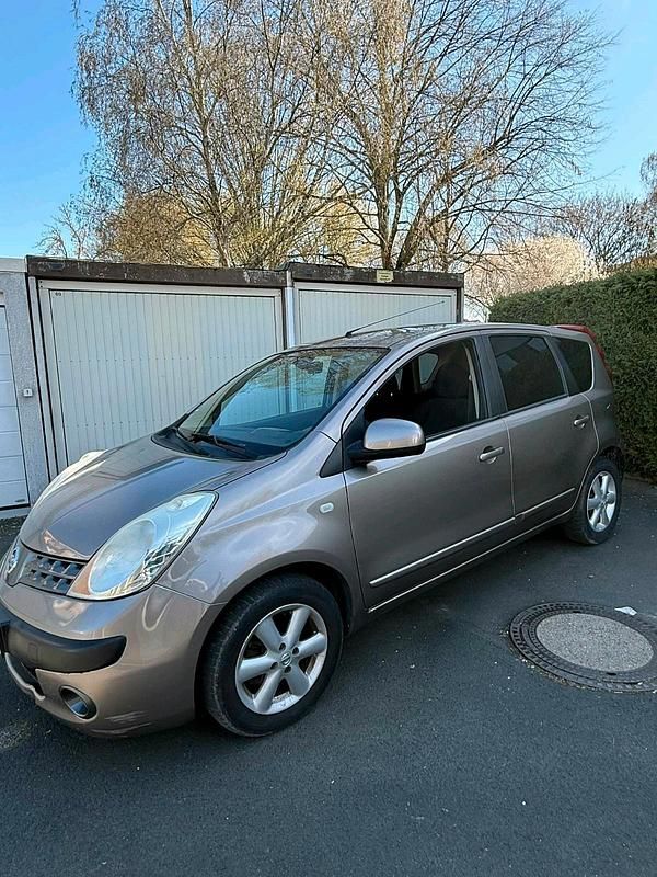 Second-hand Nissan Note 110 CP (80 kW) 2007 Auriu Hatchback