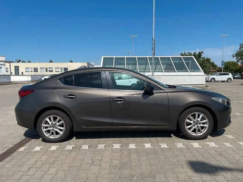 Gebraucht Mazda 3 Center-Line 120 PS (88 kW) 2014 Braun Limousine