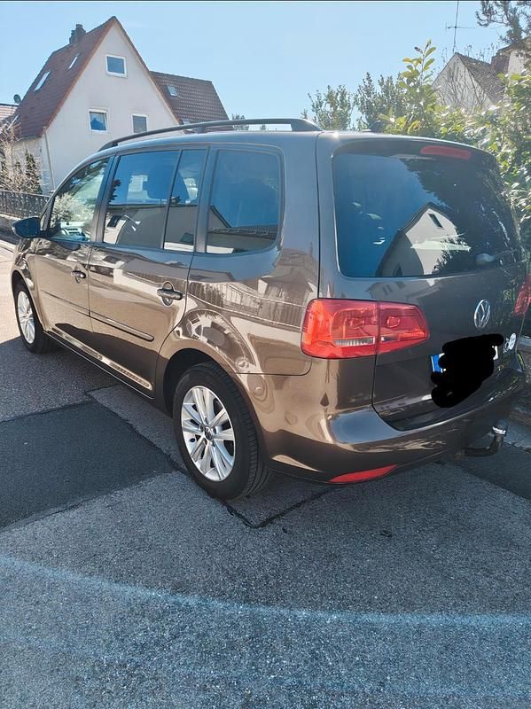 Gebraucht VW Touran 105 PS (77 kW) 2011 Braun Van / Kleinbus