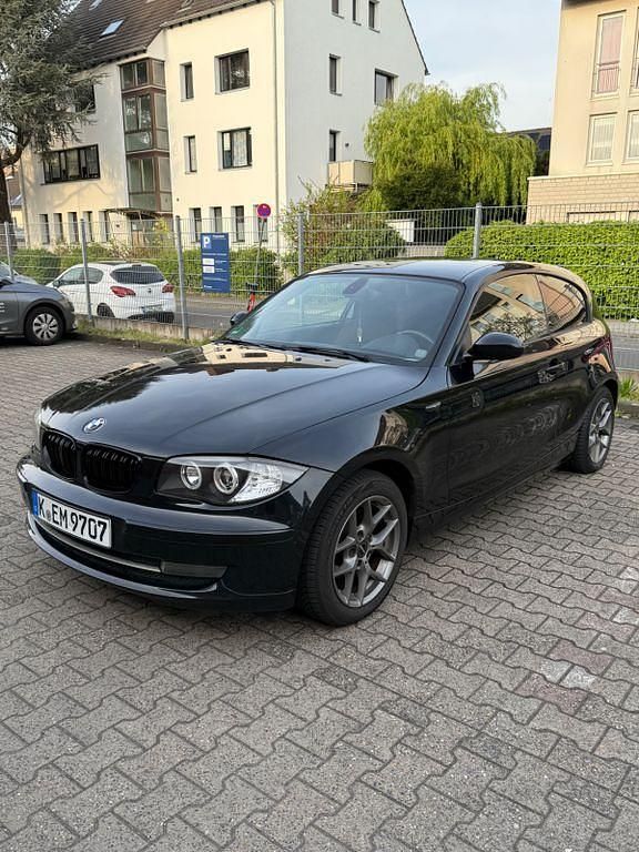 Second-hand BMW 116 122 CP (89 kW) 2008 Negru Hatchback