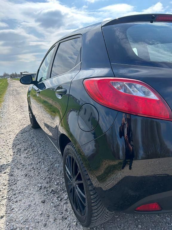 Gebraucht Mazda 2 75 PS (55 kW) 2008 Schwarz Kleinwagen