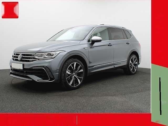 Grau metallic Gebraucht 2024 VW Tiguan Allspace R-line SUV | 44.460 € (Teuer) - Bild 1/4