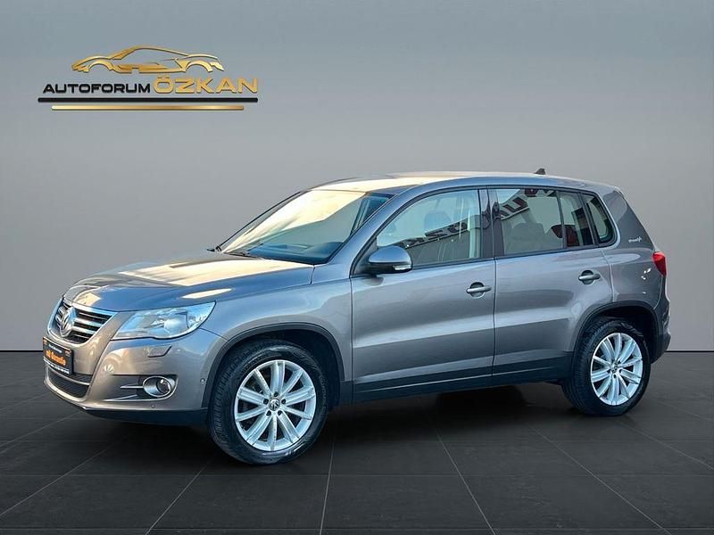 Grau Gebraucht 2011 VW Tiguan Freestyle SUV | 11.499 € (Fairer Preis) - Bild 1/4