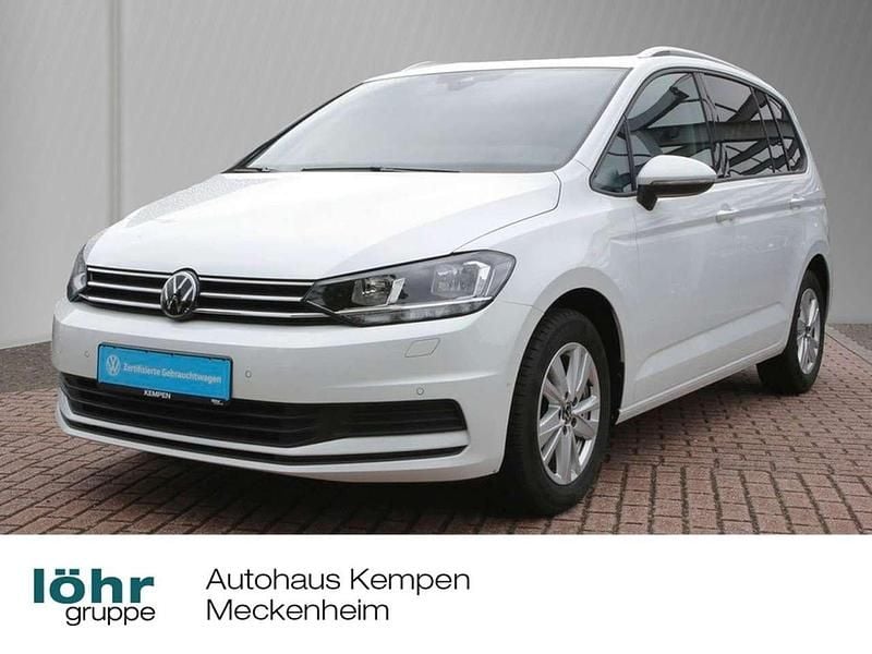 Pure white Gebraucht 2024 VW Touran Comfortline Van / Kleinbus | 31.670 € (Guter Preis) - Bild 1/4
