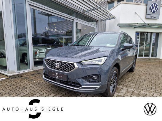 Delfingrau (metallic) Gebraucht 2021 Seat Tarraco XCELLENCE SUV | 32.880 € (Etwas zu teuer) - Bild 1/4