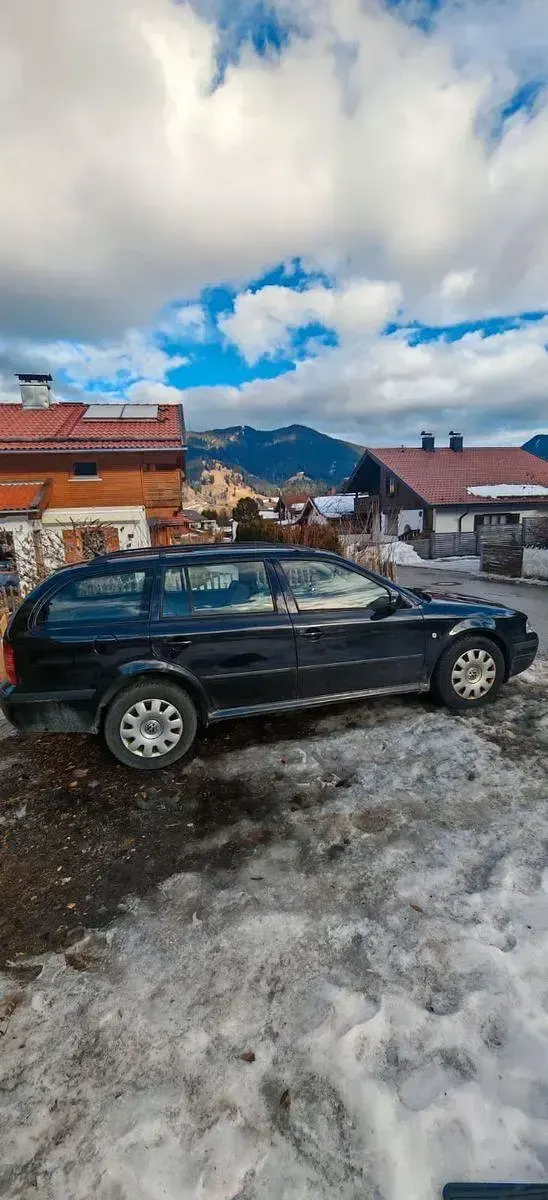 Używany Skoda Octavia 110 KM (80 kW) 2004 Czarny Kombi