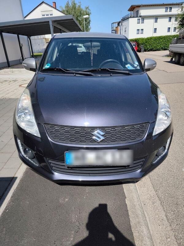 Grau Gebraucht 2015 Suzuki Swift Comfort Kleinwagen | 8.100 € (Fairer Preis) - Bild 1/4