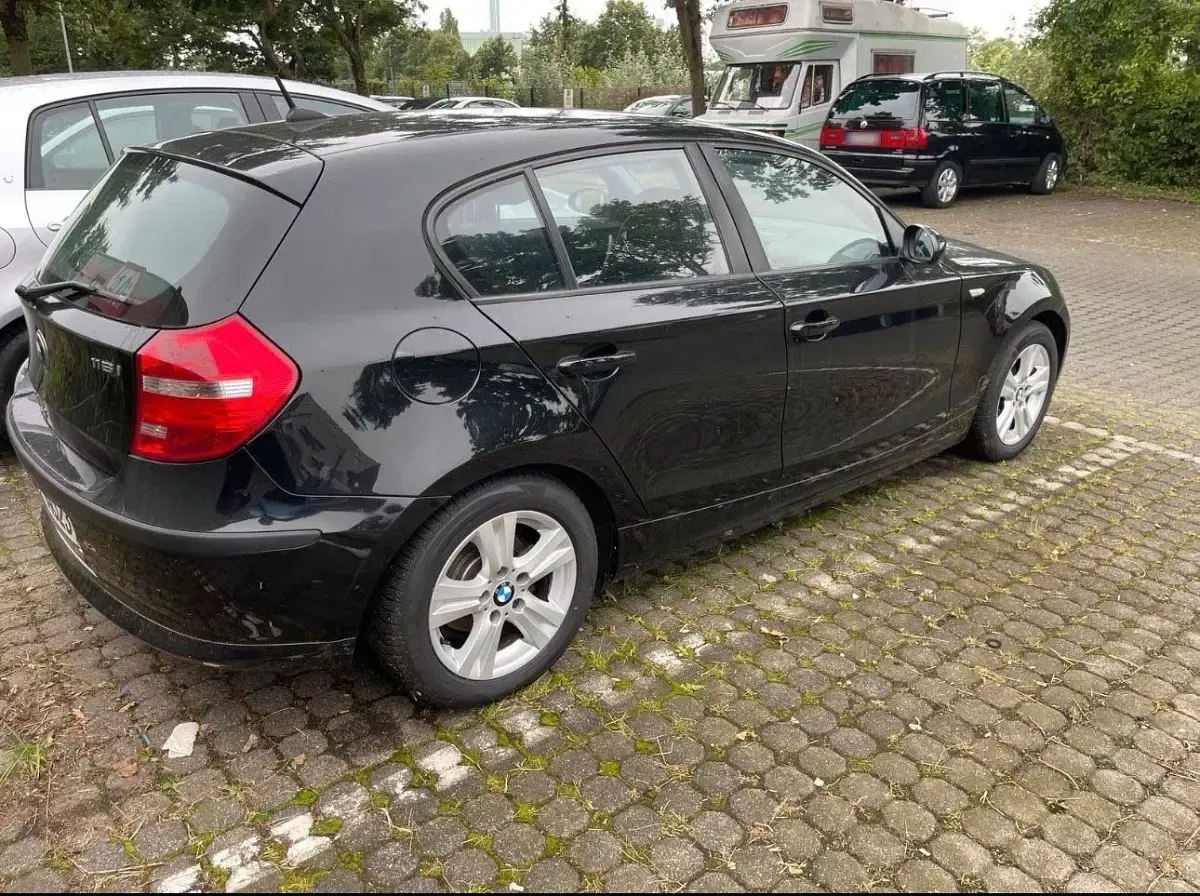 Brugt BMW 116 122 HK (89 kW) 2009 Sort Hatchback