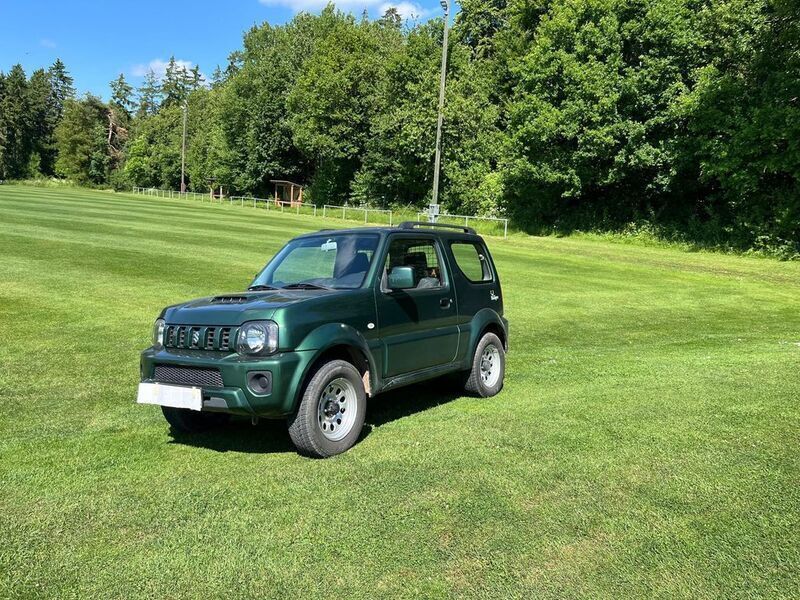 Grün Gebraucht 2015 Suzuki Jimny Comfort SUV | 13.900 € (Fairer Preis) - Bild 1/4