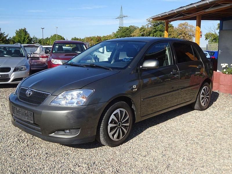 Grau Gebraucht 2002 Toyota Corolla Sol Limousine | 2.300 € (Fairer Preis) - Bild 1/4